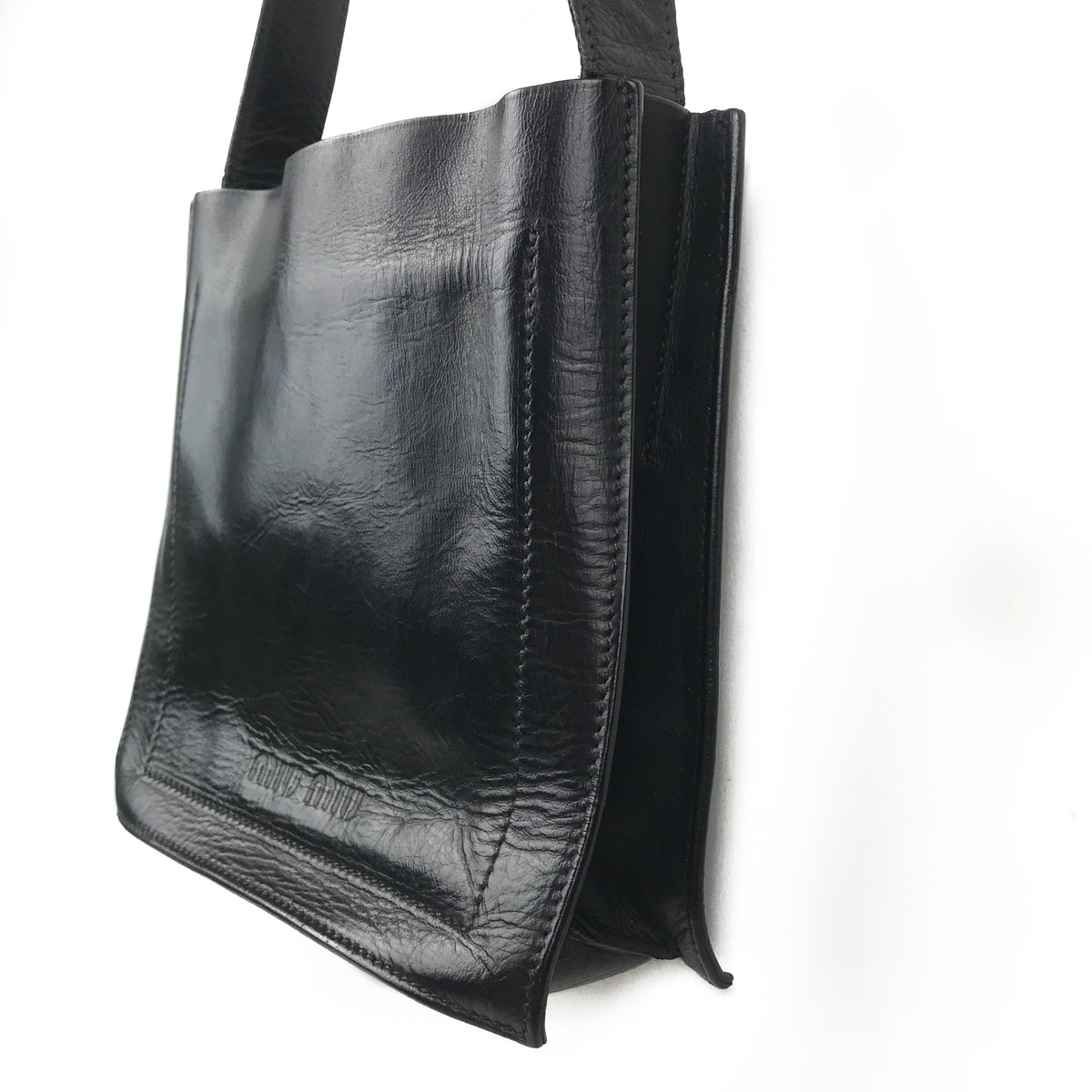 Miu Miu logo-embossed Leather Tote Bag | Black | FARFETCH